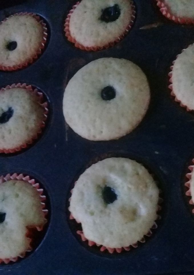 Una foto de Muffins de naranja y arándanos