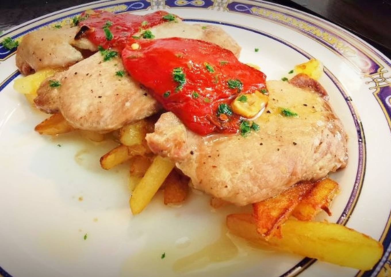 Lomo de cerdo al horno con Pimientos de Piquillo confitados