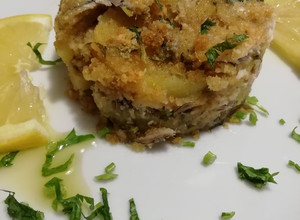 Foto di Tortino gratinato di alici e patate al forno