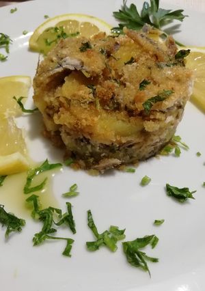Foto di Tortino gratinato di alici e patate al forno