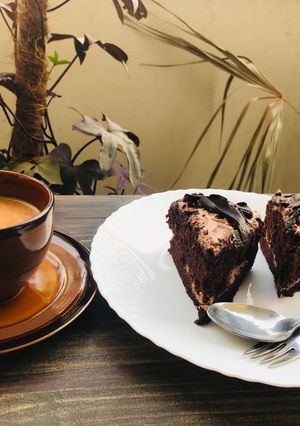 A picture of Chocolate brownie cake with tea ☕️.