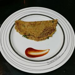 A picture of Oats Spring Onion Chilla.