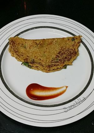 A picture of Oats Spring Onion Chilla.