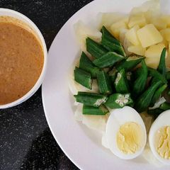 Gado Gado / Indonesian style salad with peanut sauce A picture of Gado Gado / Indonesian style salad with peanut sauce.