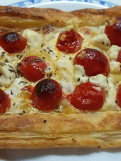 Una foto de Tarta de tomates con queso ricotta