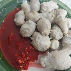 A picture of Boiled cocoyam and palmoil.