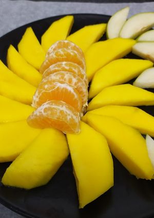 Una foto de Ensalada de mango, pera y mandarina