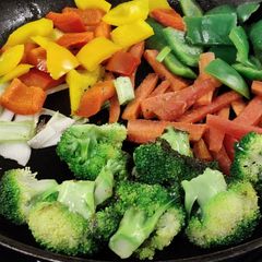 A picture of Stir fried veggies served with hard boiled eggs!.