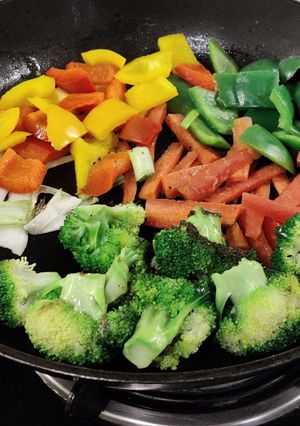 A picture of Stir fried veggies served with hard boiled eggs!.