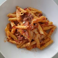 A picture of Garganelli con ragù di salsiccia e porcini.
