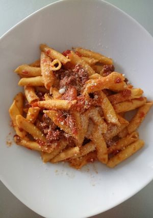 A picture of Garganelli con ragù di salsiccia e porcini.