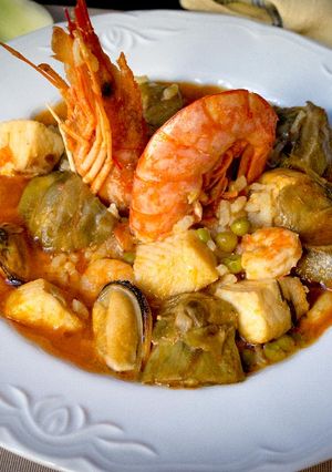Foto principal de Arroz caldoso con abadejo y alcachofas