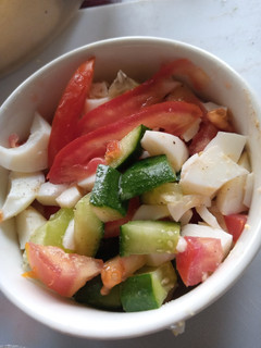 A picture of 3 colour egg veg salad.