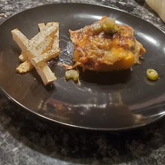 A picture of KETO - Philly Cheesesteak Stuffed Pepper and French Fries.