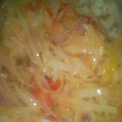 A picture of Fried cabbage and rice.