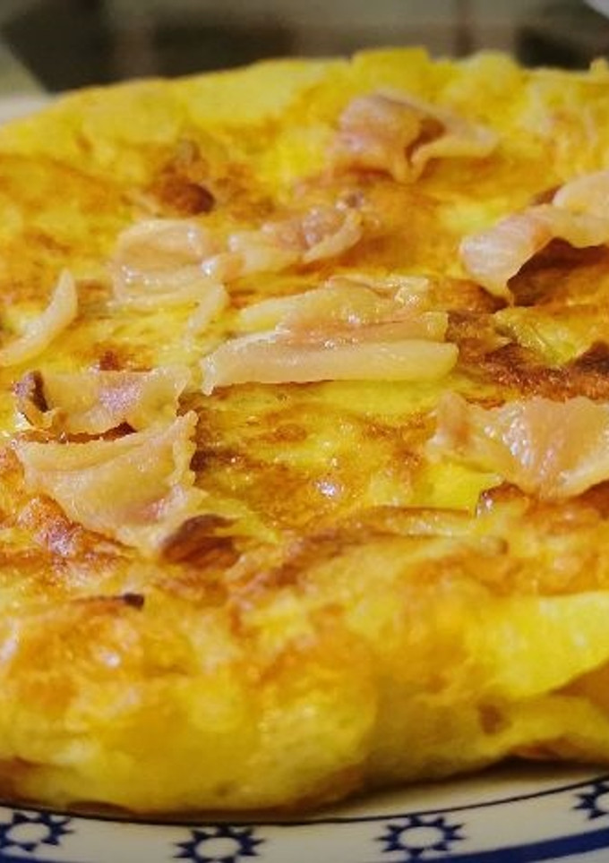 Una foto de Tortilla de Patatas con Tocino ibérico