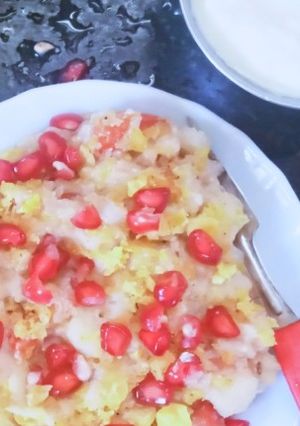 A picture of Potato chat with yogurt and tamarind chutney.