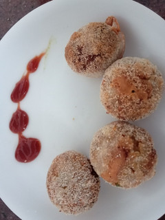 A picture of Non Fried Cheese Balls with leftover bread.
