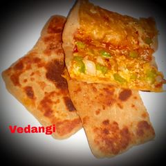 A picture of Schezwan Cheese Paratha.