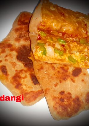 A picture of Schezwan Cheese Paratha.