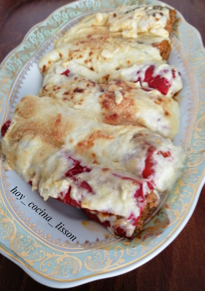 Una foto de Pimientos rellenos de carne y gratinados con salsa de puerro