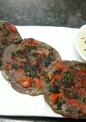 A picture of Falahari Tomato Uttapam.