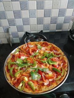 * வீட் பீசா*(Wheat Pizza recipe in tamil) செய்முறை முக்கிய புகைப்படம்