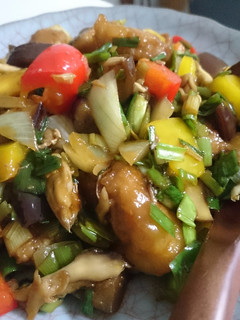 A picture of Sweet and Sour Pork with Tons of Vegetables.