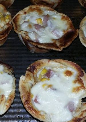 Una foto de Canastitas de jamón, queso y choclo