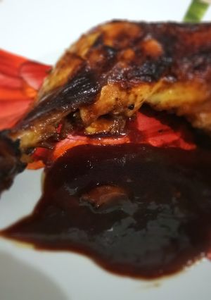 Foto principal de Muslos de Pollo al Papillote en Salsa de Naranja