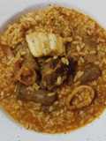 Arroz mar y montaña de costillas, salchichas, bacalao y calamar
