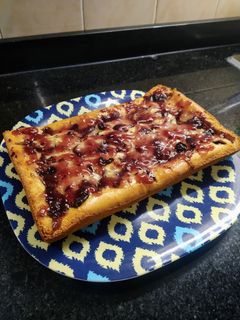 Una foto de Budín de naranja con dulce de arándanos