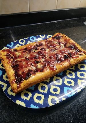 Una foto de Budín de naranja con dulce de arándanos