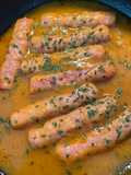 Salchichas frescas en salsa