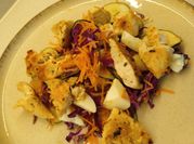 Una foto de ensalada de apio y repollo