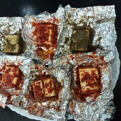 A picture of Steam paneer sauce/chattny/ foil peket.