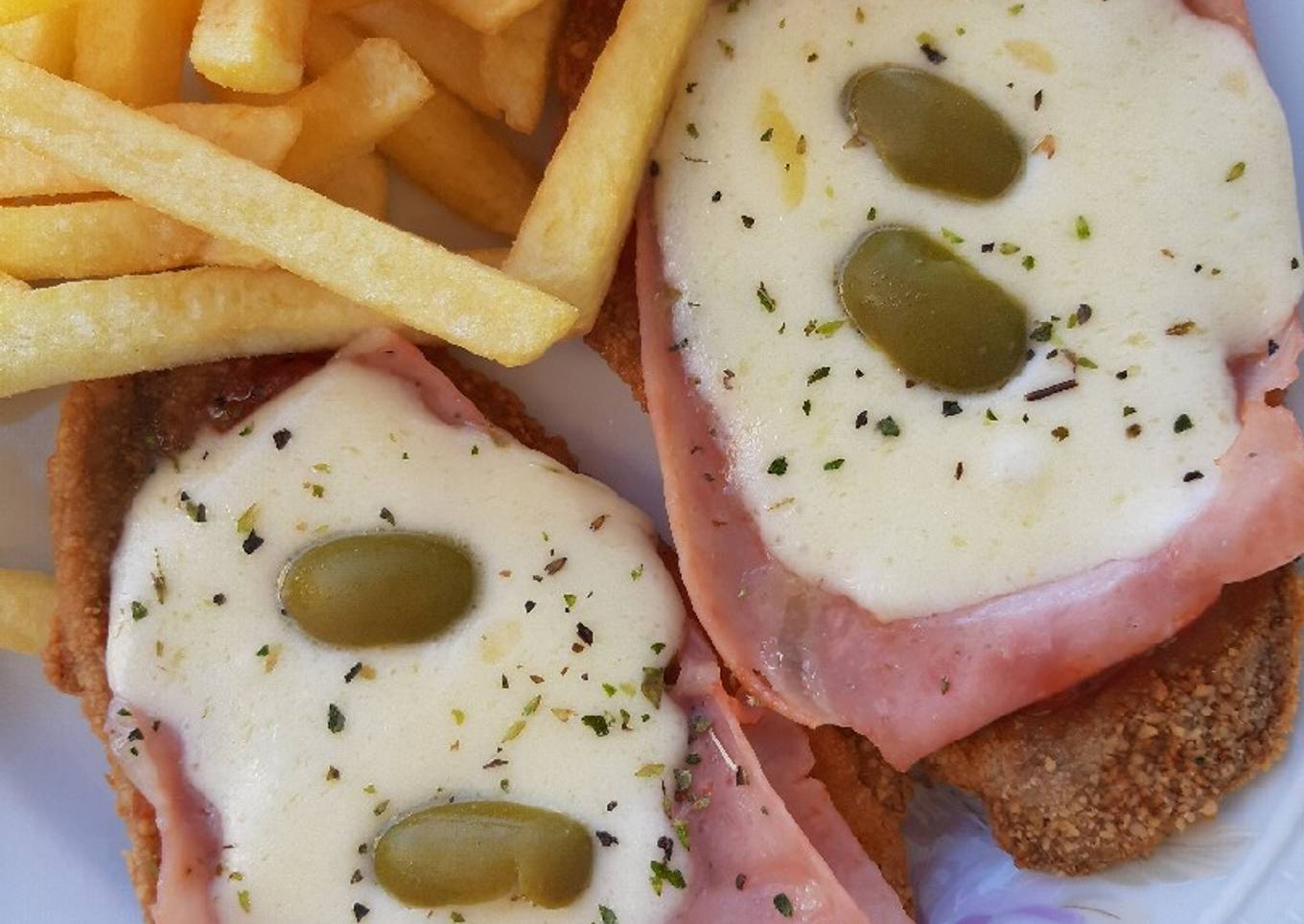 Milanesas a la Napolitana con papas fritas