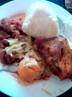 A picture of Ugali with Fried beef and steamed Cabbage.