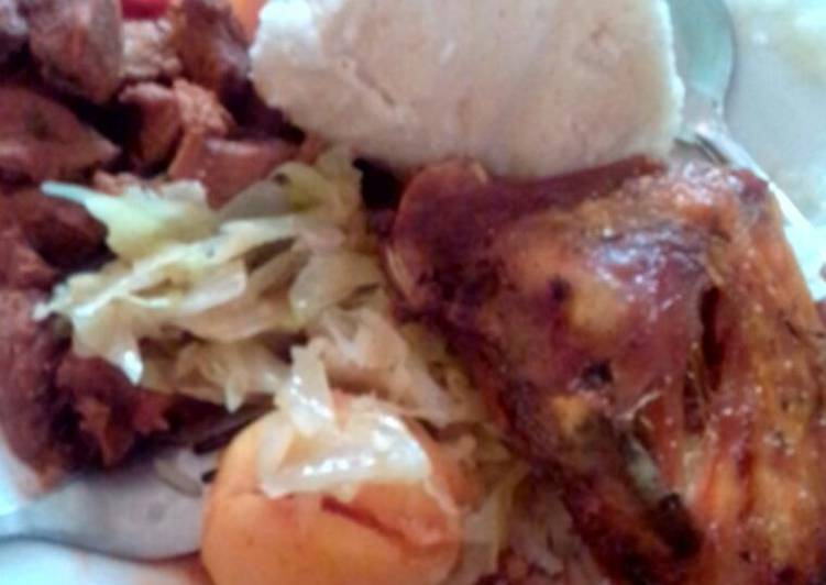 Ugali with Fried beef and steamed Cabbage