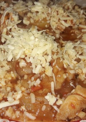 Una foto de Guiso de arroz y pollo 🤗
