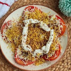 A picture of Tomato Slice Chaat.