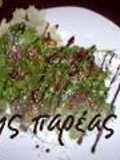Arugula with caramelised figs in a parmesan nest