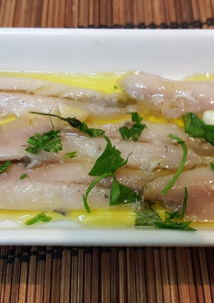 Una foto de Carpaccio de anchoas