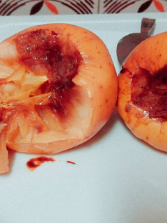 Una foto de Manzanas asadas al horno con algarrobina 😋