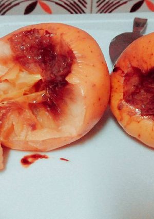Una foto de Manzanas asadas al horno con algarrobina 😋