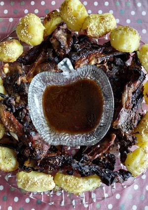 A picture of Lamb Chops and Sesame Potatoes.