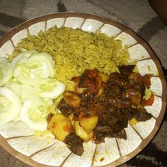 A picture of Rice & potato sauce.