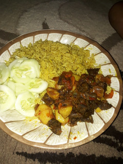 A picture of Rice & potato sauce.