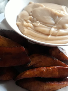 A picture of Fried plantain and pap.