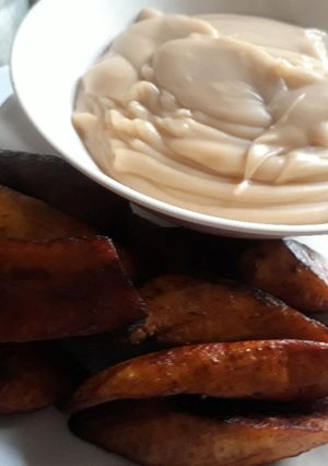 A picture of Fried plantain and pap.